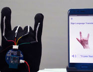 Об электронном паспорте внутри смартфона и перчатке для перевода языка жестов
